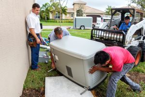 technicians-installing-whole-house-generator