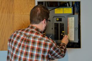 electrician-working-on-electrical-panel